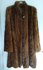 Pregiata pelliccia in codini